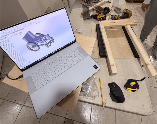 Early workspace showing the wheelchair and tools, providing context for the problem being solved