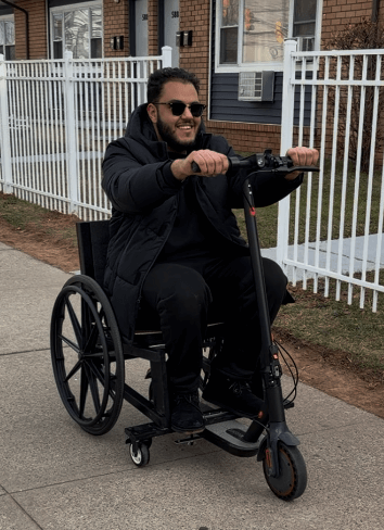 Real-world testing of the wheelchair system showing stability and functionality in an outdoor or hallway setting